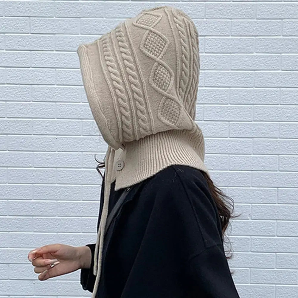 Capuche tricotée à Cordon