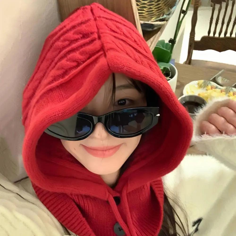 Capuche tricotée à Cordon